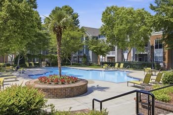Two refreshing swimming pools with expansive sundecks